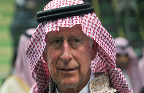 Britain's Prince Charles arrives to participate in the traditional Saudi dancing known as 'Arda' during the Janadriya culture festival at Der'iya in Riyadh