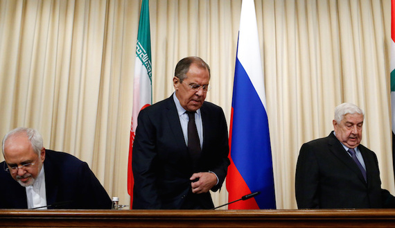 Russian Foreign Minister Lavrov, Syrian Foreign Minister al-Muallem and Iranian Foreign Minister Zarif attend a news conference in Moscow
