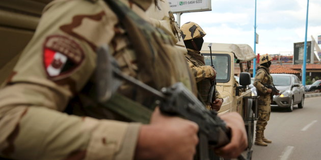 Soldiers stand guard on the fifth anniversary of the uprising that ended the 30-year reign of Hosni Mubarak, in Alexandria, Egypt,