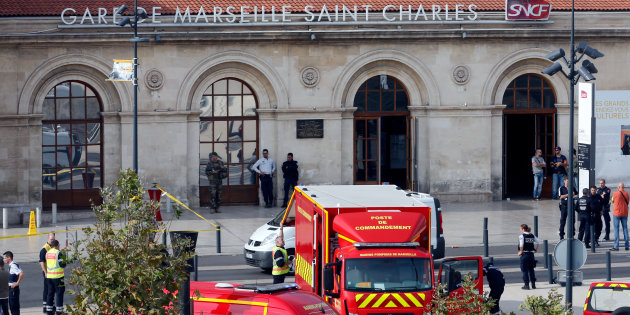 Emergency services vehicles are seen outside the Saint-Charles train station after French soldiers shot and killed a man who stabbed two women to death at the main train station in Marseille