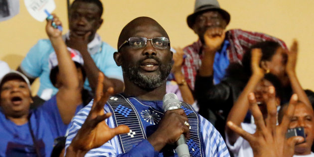 Weah, former soccer player and presidential candidate of Congress for Democratic Change (CDC), delivers a speech during the party's presidential campaign rally at Samuel Kanyon Doe Sports Complex in Monrovia, Liberia