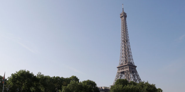 The Bubbles water taxi flies above the surface of the Seine River near the Eiffel Tower during a demonstration by the SeaBubbles company in Paris