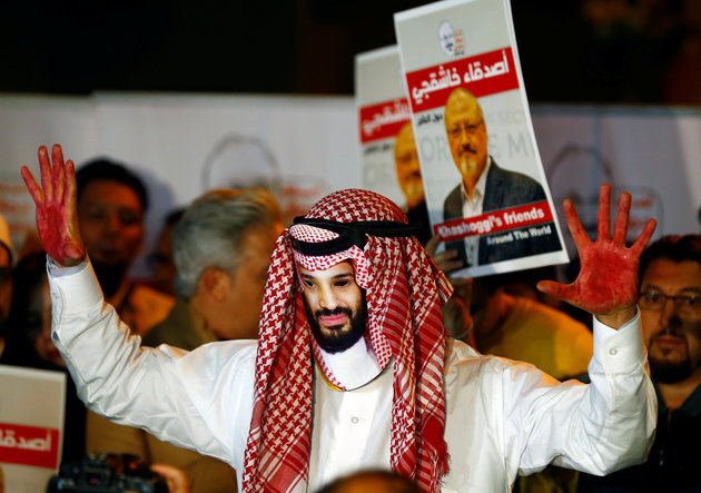 A demonstrator wearing a mask of Saudi Crown Prince Mohammed bin Salman attends a protest outside the Saudi Arabia consulate in Istanbul