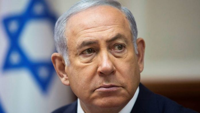 Israeli Prime Minister Benjamin Netanyahu attends the weekly cabinet meeting at the Prime Minister's office in Jerusalem