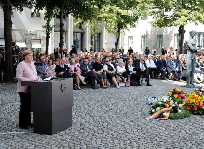 German Chancellor Angela Merkel attends a ceremony to mark the 75th anniversary in the