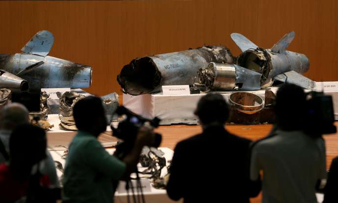 Remains of the missiles which Saudi government says were used to attack an Aramco oil facility, are displayed during a news conference in Riyadh