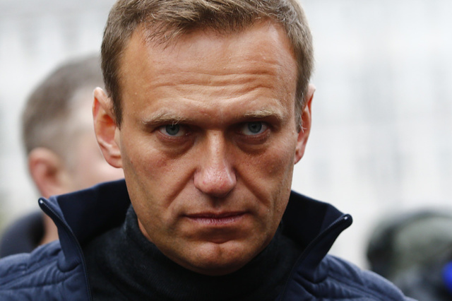 Alexei Navalny unconscious in hospital with suspected poisoning