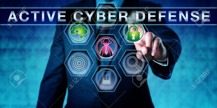 Businessman Pressing ACTIVE CYBER DEFENSE