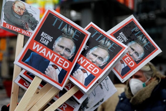 People demonstrate against Russia's invasion of Ukraine, in Toronto