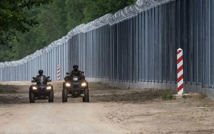 FILES-POLAND-BELARUS-EU-MIGRANTS-WALL