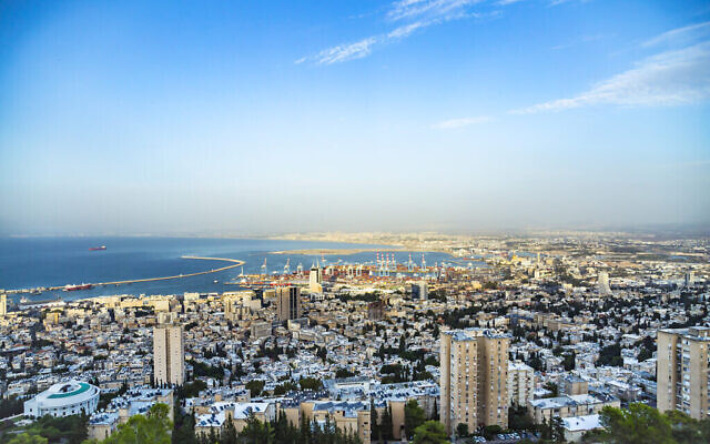 Panoramic view of the harbor port of Haifa, with downtown Haifa, the harbor, the industrial zone in a sunny summer day. Haifa, Northern Israel